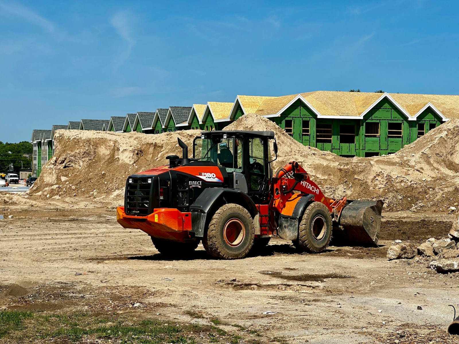 a tractor is parked in front of a construction site