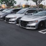 black mercedes benz coupe on parking lot during daytime