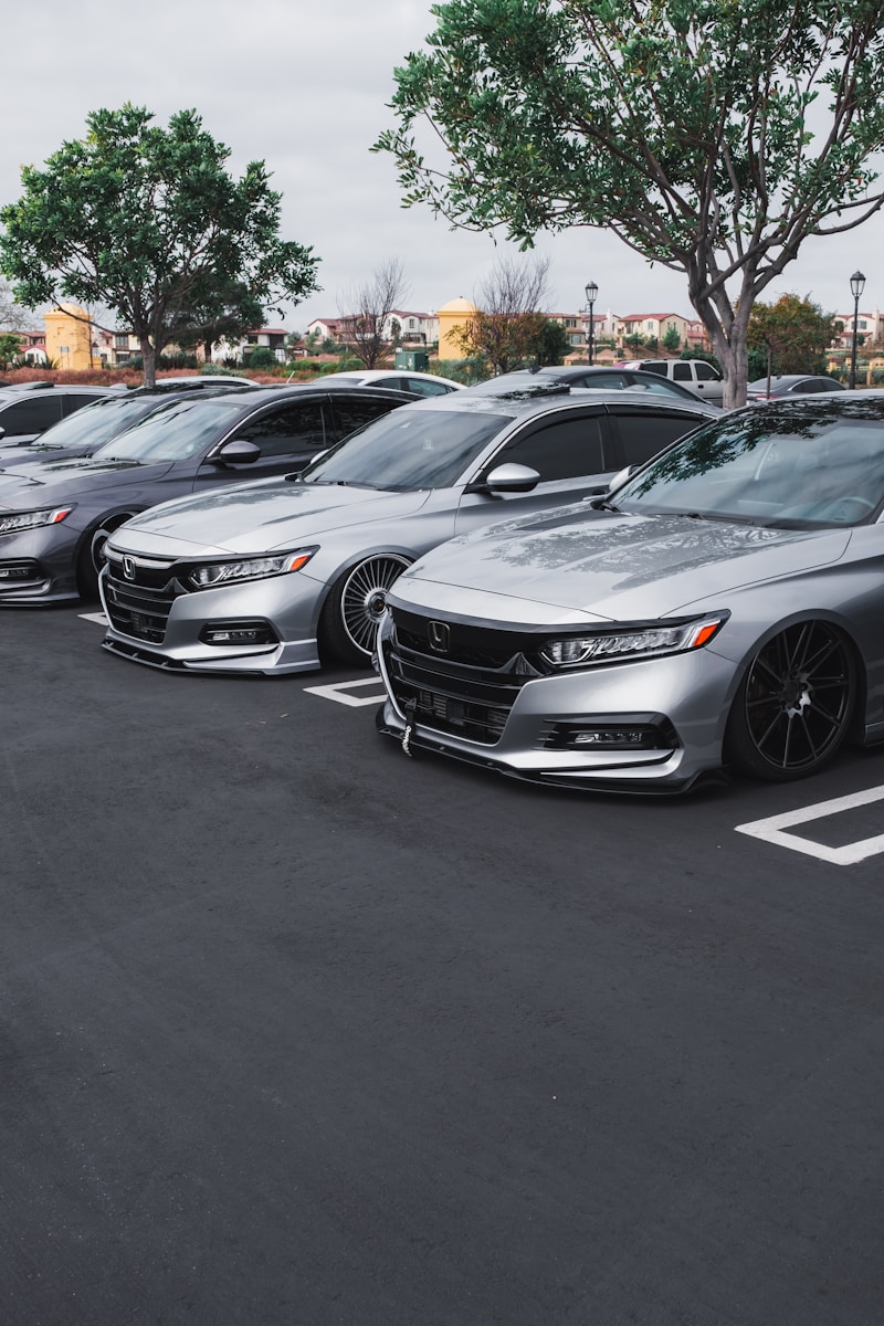 black mercedes benz coupe on parking lot during daytime